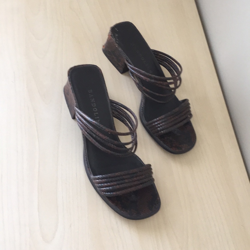 Brown and black snake print sandals by Bandolino